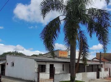 lateral + frente · Casa no bairro Restinga - 2 dormitórios