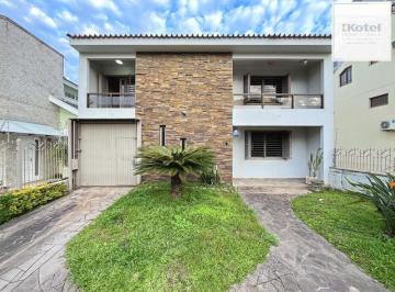 Casa · 385m² · 5 Quartos · 3 Vagas · Casa semimobiliada com 5 dormitórios, piscina e 3 vagas no Camaquã Porto Alegre