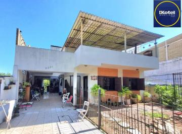 Fachada da casa 2 · Casa à venda - em Cavalhada