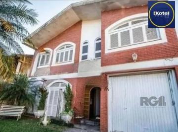 Casa · 242m² · 4 Quartos · 3 Vagas · Casa sobrado no bairro Tristeza de 4 dormitórios 3 vagas