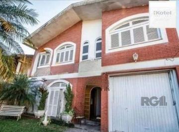 Casa · 242m² · 4 Quartos · 3 Vagas · Casa sobrado no bairro Tristeza de 4 dormitórios 3 vagas