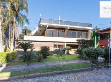 Casa · 375m² · 3 Quartos · 4 Vagas · Casa em condomínio que possui 3 dormitórios, sendo 1suíte, lavabo, escritório,