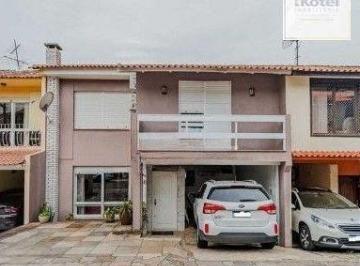 Casa · 240m² · 4 Quartos · 2 Vagas · Casa em condomínio no bairro Santo Antônio de 4 dormitórios e 2 vagas