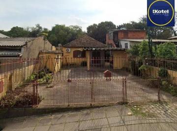 Casa · 70m² · 3 Quartos · 4 Vagas · Excelente imóvel com terreno amplo à venda no Jardim Itu – Porto Alegre