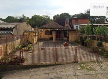 Casa · 70m² · 3 Quartos · 4 Vagas · Excelente imóvel com terreno amplo à venda no Jardim Itu – Porto Alegre