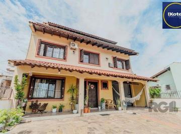 Casa · 234m² · 3 Quartos · 3 Vagas · Casa com 234m², 3 dormitórios, 3 vagas no bairro Partenon