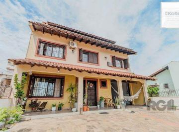 Casa · 234m² · 3 Quartos · 3 Vagas · Casa com 234m², 3 dormitórios, 3 vagas no bairro Partenon