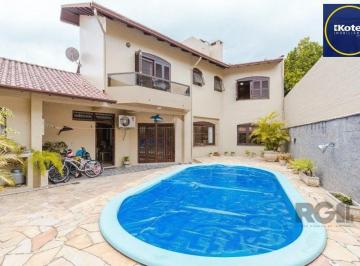 Casa · 295m² · 4 Quartos · 2 Vagas · Casa com 4 dormitórios no bairro Morro Santana