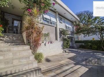 Casa · 196m² · 4 Quartos · 3 Vagas · Casa de 4 dormitórios no bairro Glória