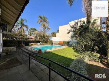 Casa · 240m² · 3 Quartos · 5 Vagas · Casa térrea, com 3 dormitórios, sendo 2 suítes, 5 vagas, piscina, no bairro Ipan