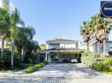 Casa · 458m² · 5 Quartos · 4 Vagas · Casa no Condomínio Las Rocas, vista para o Guaíba, com 5 suítes