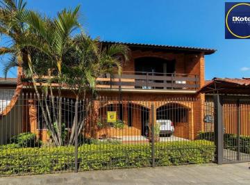 Casa · 405m² · 6 Quartos · 4 Vagas · Casa com 6 dormitórios à Venda no Bairro Jardim Carvalho, Porto Alegre