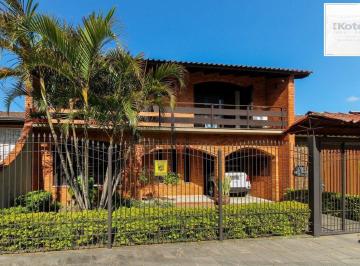 Casa · 405m² · 6 Quartos · 4 Vagas · Casa com 6 dormitórios à Venda no Bairro Jardim Carvalho, Porto Alegre