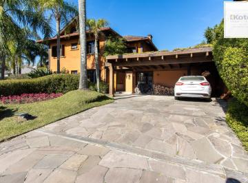 Casa · 385m² · 6 Quartos · 5 Vagas · Casa à venda no Terra Ville com 6 dormitórios e fundo para o lago.