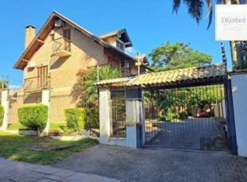 Casa · 268m² · 4 Quartos · 2 Vagas · Casa em condomínio em Ipanema de 3 dormitórios e 2 vagas