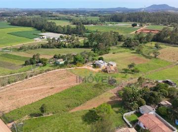 aa612b1934d8d6e3a94f844f2c192dcf2816fa1c · Terreno à venda, 25000 m² por R$ 1.100.000,00 - Ponta do Mato - Içara/SC