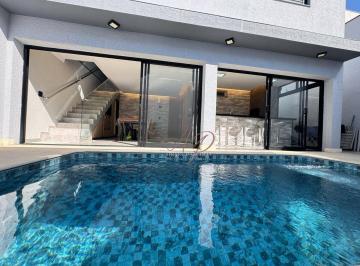 8ce8b45cce75fc6ae435c548329c07545e84368e · Casa com 3 suítes, piscina, ACEITA PERMUTA à venda, 240 m² por R$ 1.580.000 - Condomínio Villagio Mi