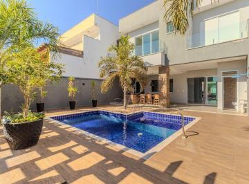 7b299552a19b8689a7efdce3c94b7047e05b9371 · Casa com 3 dormitórios à venda, com piscina aquecida, 240 m² por R$ 1.450.000 - Condomínio Villagio 