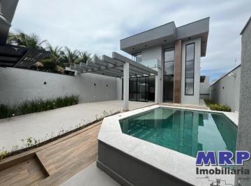Foto 01 · Casa alto padrão em Caraguatatuba no bairro Massaguaçu.