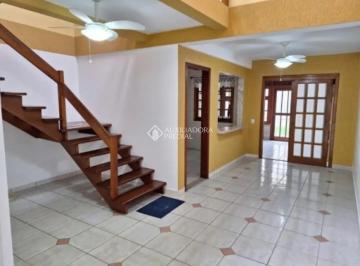 749349_iwl36_74934968ecfb61b61ab.jpg · Casa com três dormiórios, suíte, vaga de garagem