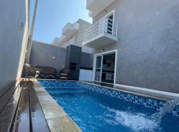 Foto 01 · Sobrado com piscina em frente ao mar