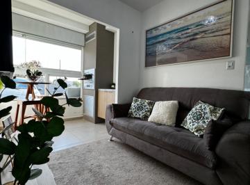Sala integrada à varanda com churrasqueira · Apartamento 3 Quartos Rita Vieira - Villas de Bilbao