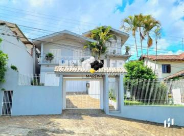 Casa · 293m² · 3 Quartos · 2 Vagas · Casa a Venda em Novo Hamburgo Bairro Ideal com Linda Piscina