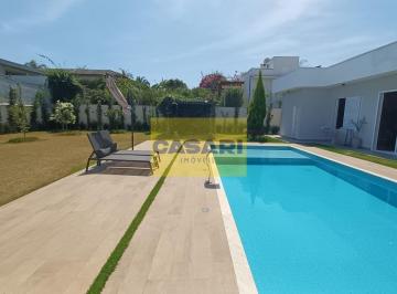 Photo 1 · Casa de alto padrão, com 5 dormitórios, sendo 3 suítes, cozinha com planejados,