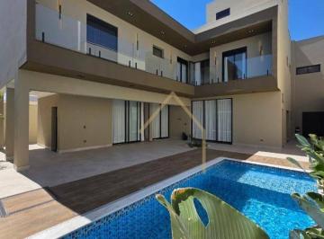 a74cafbc2c7d59cef713a3c816d7f3235edccd13 · Casa com 4 dormitórios à venda, 400 m² por R$ 3.700.000,00 - Condomínio Phillipson Park - Americana/