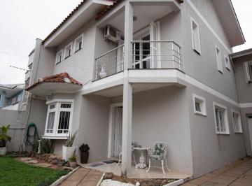 Casa · 216m² · 3 Quartos · 3 Vagas · Casa sobrado no bairro Mont Serrat em Canoas