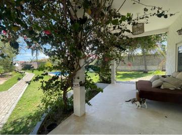 Casa · 220m² · 5 Quartos · 12 Vagas · Linda casa com Chalé em  amplo terreno na praia de Guajirú de Itarema