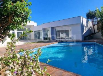 Casa · 667m² · 5 Quartos · 3 Vagas · Casa térrea alto padrão à venda com cinco suítes, piscina e vista para área verde no Condomínio Mais