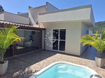 Casa · 120m² · 3 Quartos · 1 Vaga · Sobrado com suíte, piscina e área gourmet em Potecas/SC