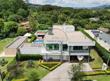 Casa · 1127m² · 5 Quartos · 4 Vagas · Casa de Alto Padrão com Vista e Lazer Completo – Porto Bragança
