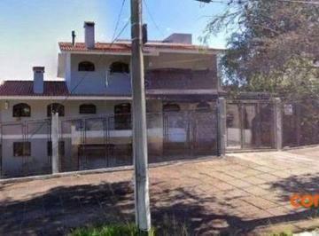 461156273b5b609a122a36626c0abb8fc6f19e20 · Belíssima casa com 5 dormitórios no bairro Tristeza