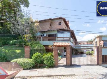 Casa · 204m² · 3 Quartos · 2 Vagas · Casa em condomínio fechado para venda no bairro Jardim Isabel, com aproximadamen