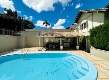 Casa · 221m² · 3 Quartos · 2 Vagas · casa com piscina, churrasqueira 03 quartos no Bairro Vila Nova em Novo Hamburgo