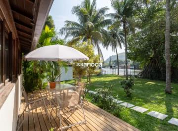 Esta casa exclusiva com 480m de área construída está situada em um terreno priva · Oásis Exclusivo na Ilha da Gigoia