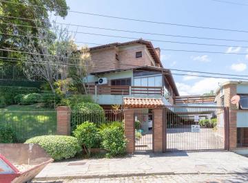 Casa · 204m² · 3 Quartos · 2 Vagas · Casa em condomínio fechado para venda no bairro Jardim Isabel, com aproximadamen