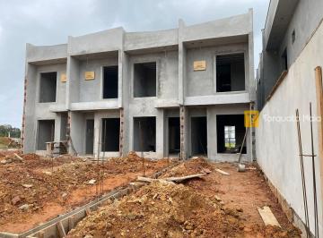 Casa · 75m² · 2 Quartos · 2 Vagas · Terreno com área livre nos fundos e duas vagas na frente