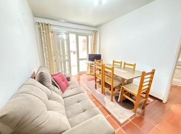 Apartamento · 65m² · 2 Quartos · Apartamento de 2 dormitórios, 2 banheiros com sacada ampla, no centro de Capão da Canoa