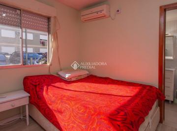 02apto-203005 · Apartamento à venda no bairro Santo Antônio, em Porto Alegre.