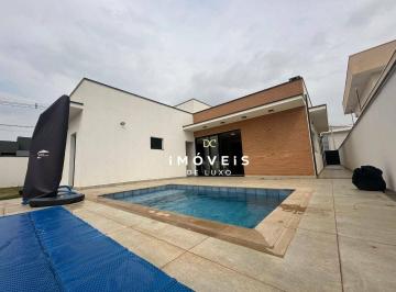 fb003f13e91f66f699da150917875200b8522901 · Casa com 3 suítes e piscina e esquina vizinha para área verde à venda no Condomínio Portal dos Bande