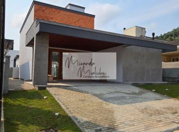 Casa · 220m² · 4 Quartos · 2 Vagas · Casa em Condomínio em Cachoeira do Bom Jesus, Florianópolis/SC