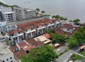 Foto 01 · Apartamento à venda na praia do Itaguá prédio frente mar.