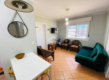 Apartamento · 40m² · 2 Quartos · 1 Vaga · Apartamento de 2 dormitórios de frente no centro de Capão da Canoa com box/vaga de garagem