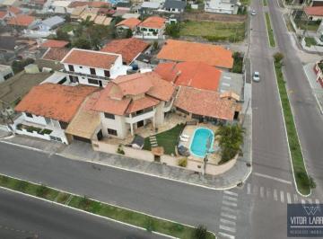 Casa · 300m² · 4 Quartos · 4 Vagas · Casa de esquina à venda Imbituba SC, com piscina