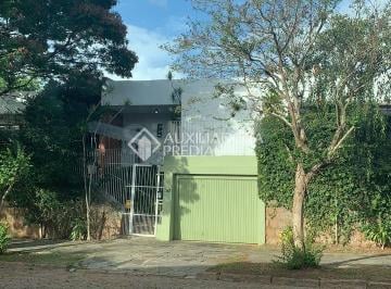 751825_is9s9u_75182568f1784f91c84.jpg · Casa 4 dormitórios(1 suíte), à venda no bairro chácara das Pedras, Porto Alegre