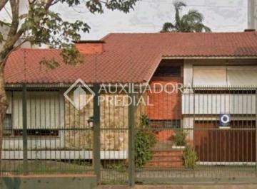 756676_io2u2j_75667668f1b43d57c5d.jpg · Casa Comercial 380m² no Auxiliadora com 3 dormitórios e 4 vagas