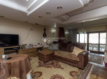 752292_ir9x2c_75229268f1a2b2f0e03.jpg · Casa de 110m² no Passo da Areia com 4 dormitórios e amplo salão comercial